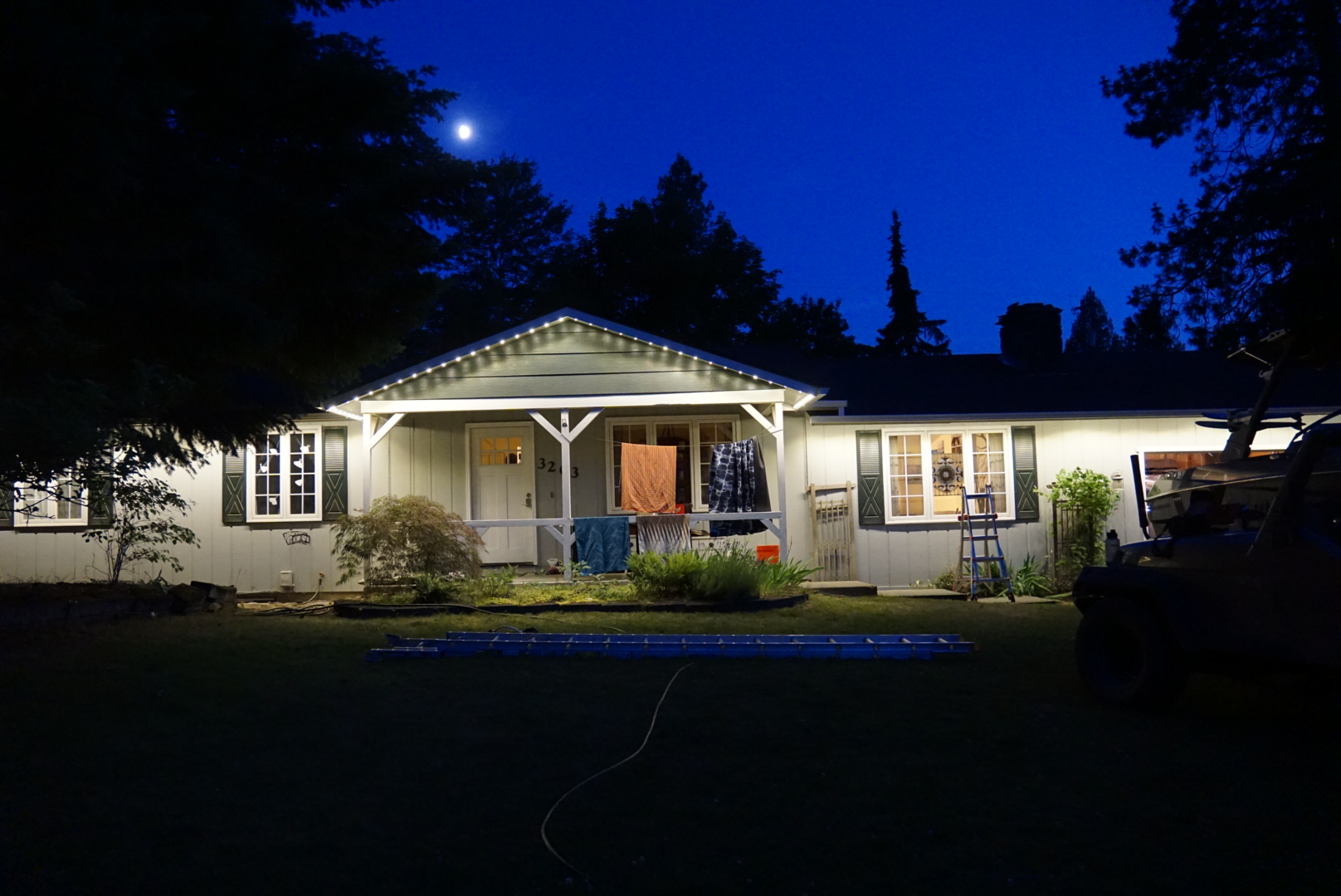 Warm White Porch Roofline — permanent exterior lighting in Front elevation